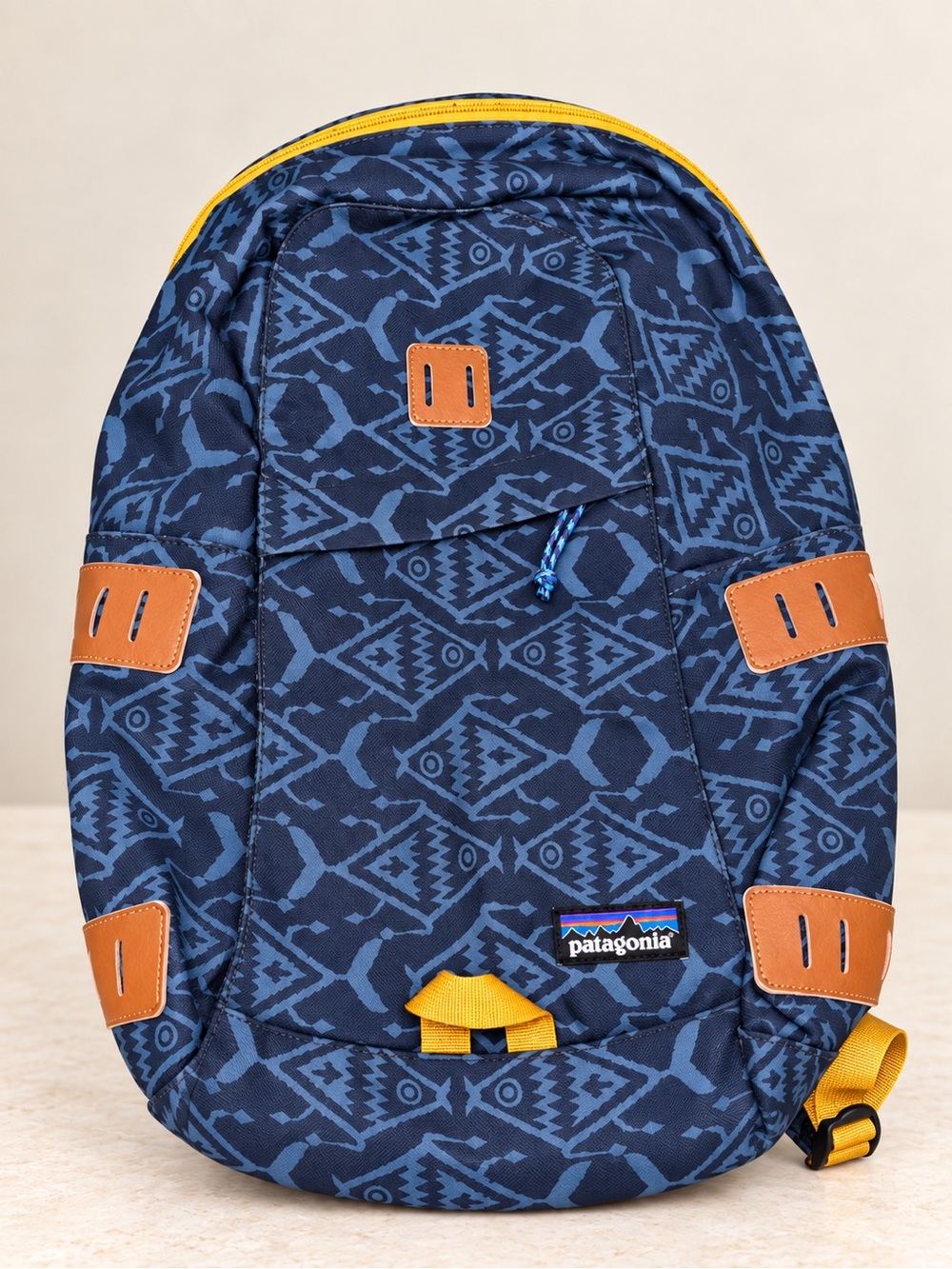 Patagonia Navy Blue Patterned Backpack with Yellow Accents